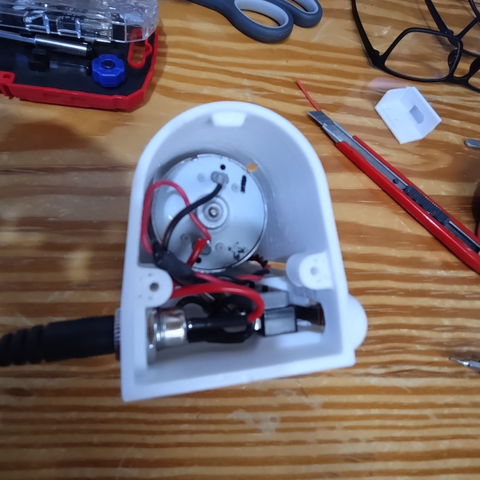 rear view inside the machine: power jack, motor, micro switch 